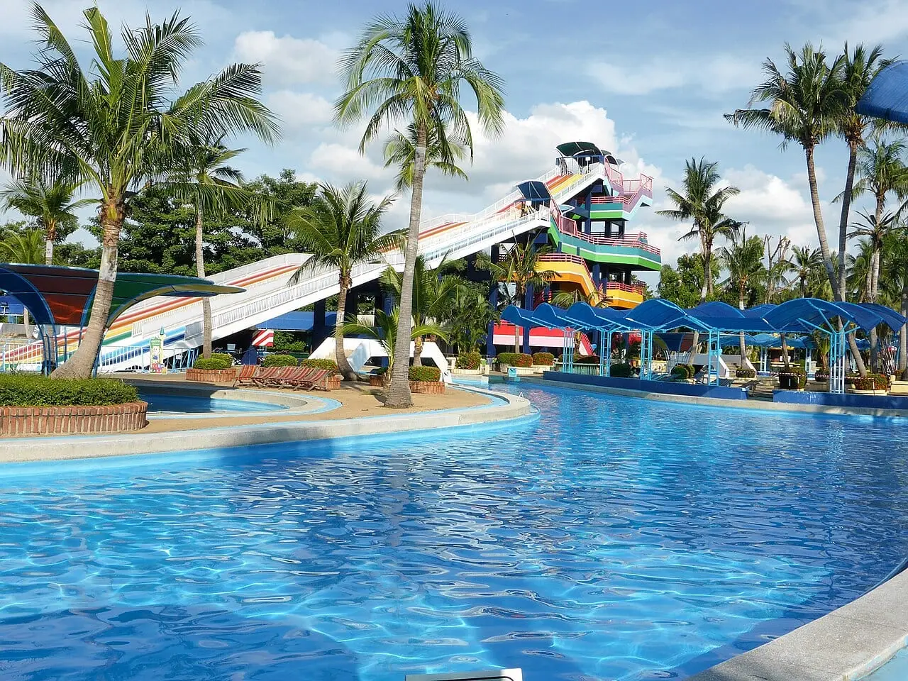 Slides and a pool at a tropical water park