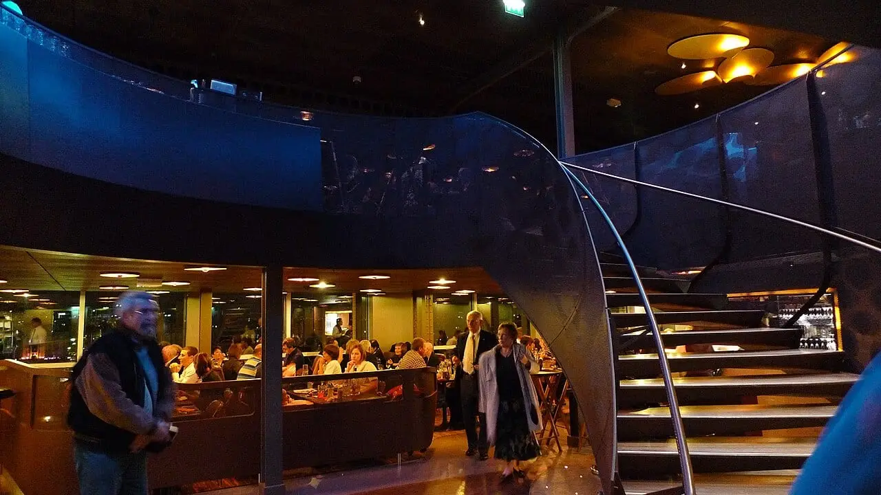 The Eiffel Tower's first-floor restaurant at night