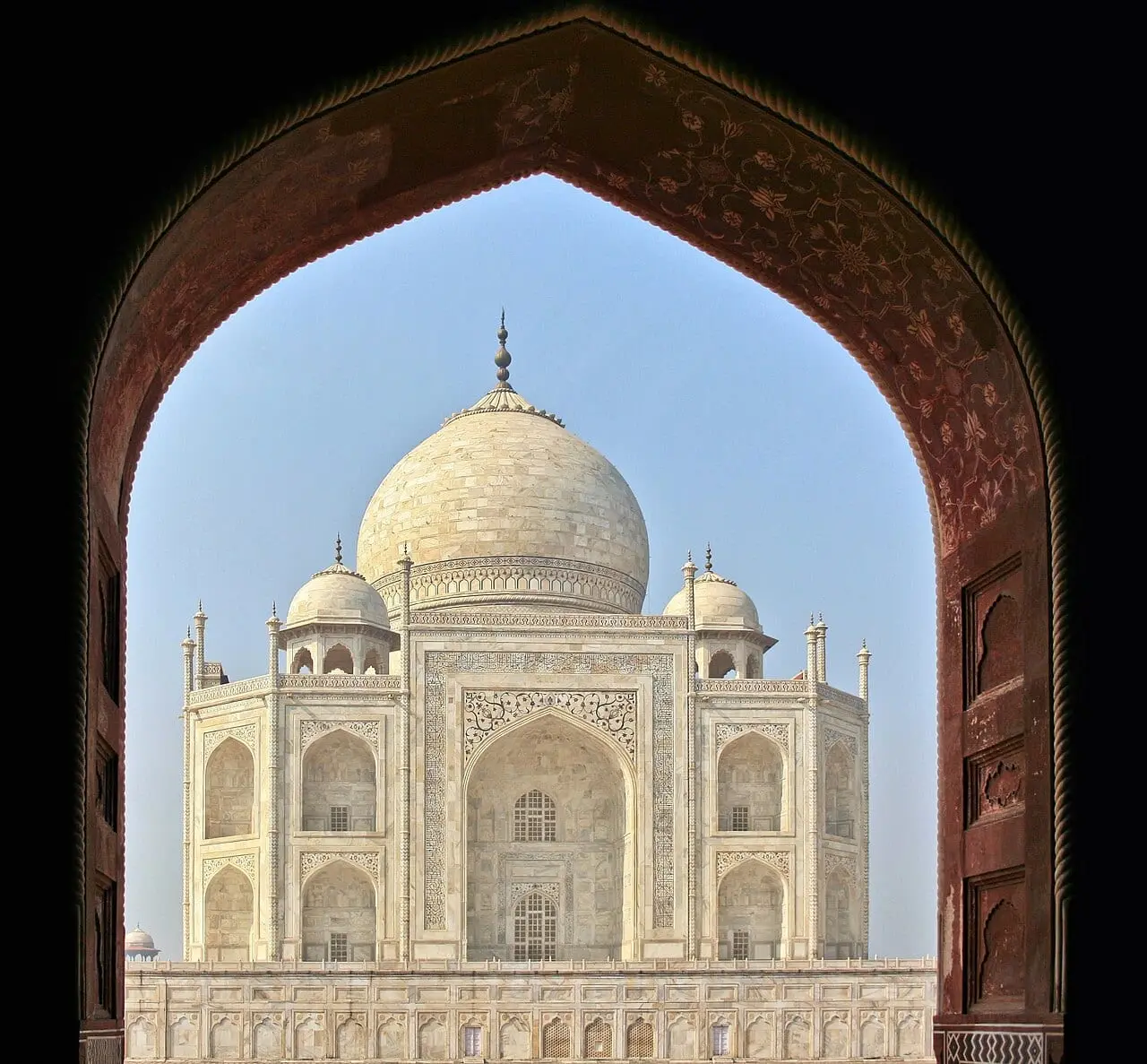 The Taj Mahal framed by the arch of the great gate
