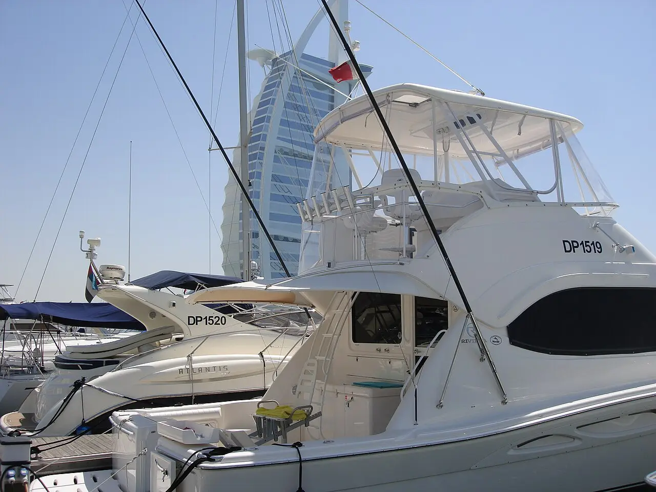 Yachts lined up along the Dubai Marina promenade