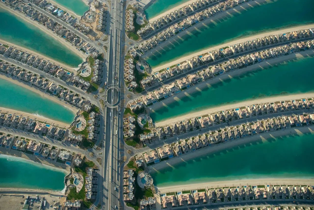 Aerial view of the Palm Jumeirah's fronds and trunk in the Arabian Gulf