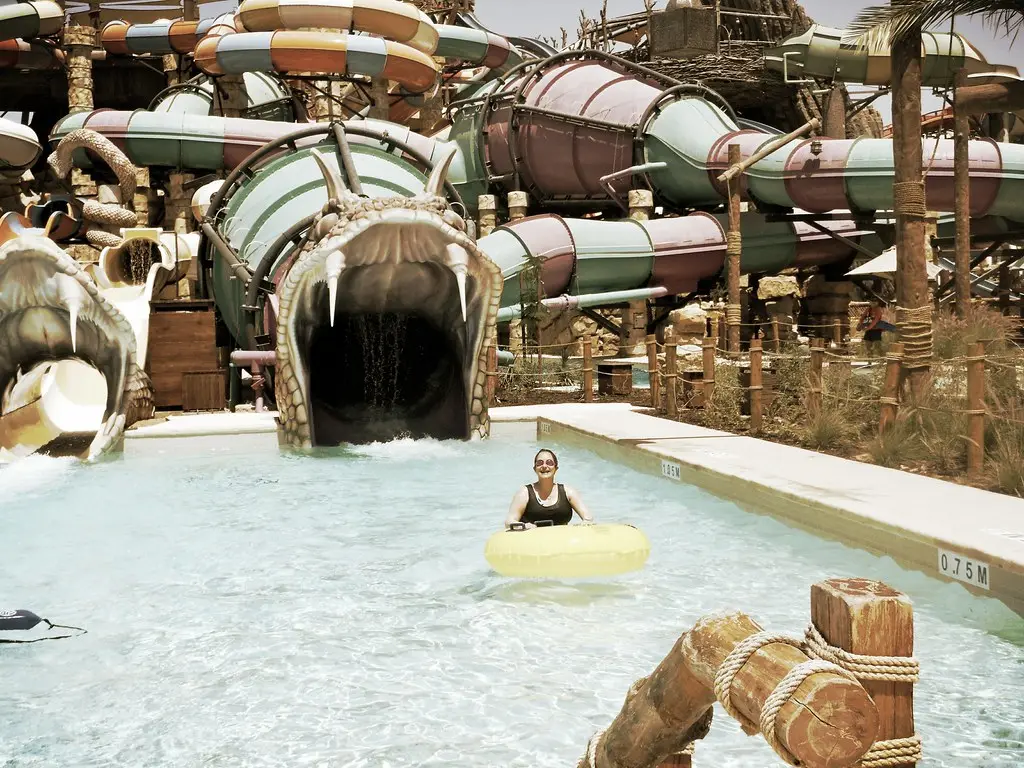 Visitors floating along the lazy river at Yas Waterworld