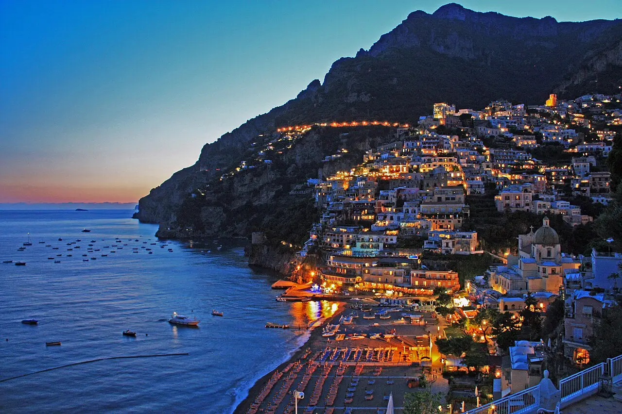 Positano lit up at night