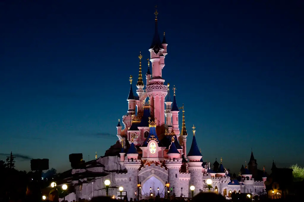 Sleeping Beauty Castle at Disneyland Paris at dusk
