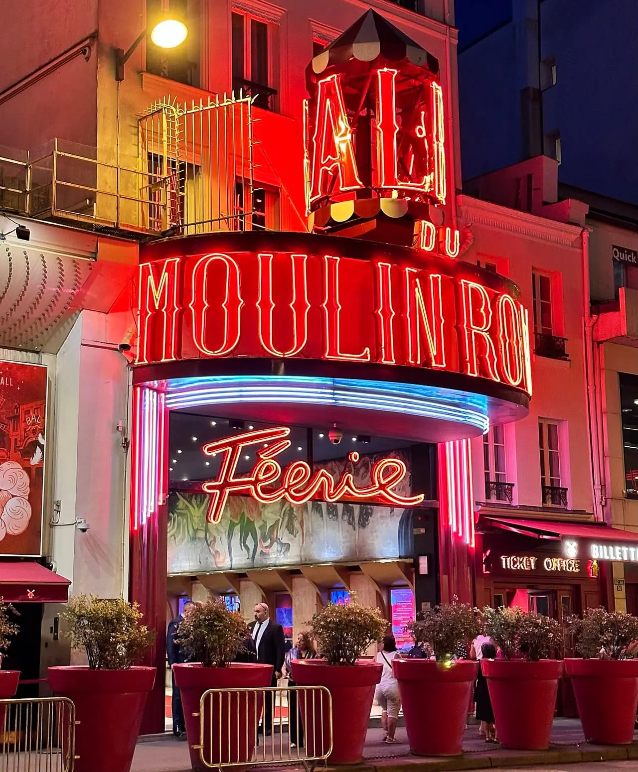 The Moulin Rouge entrance with the Féerie sign