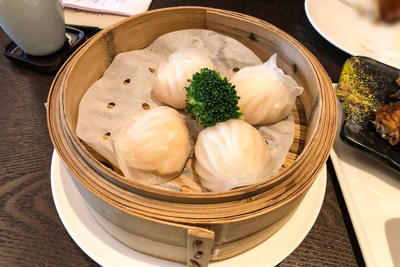 Har gow shrimp dumplings in a bamboo steamer
