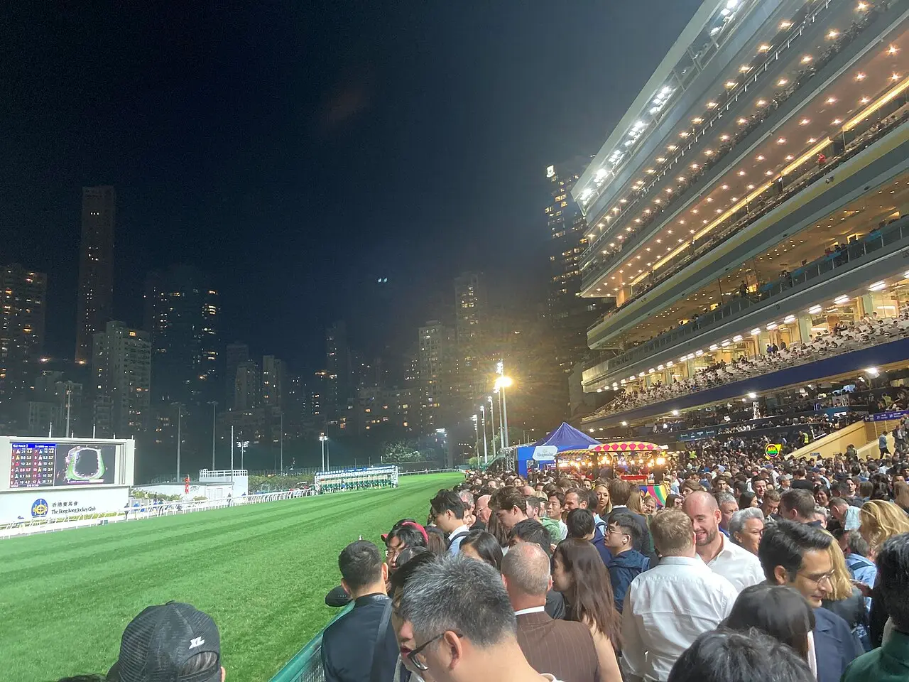 Race-night crowds at Happy Valley under the floodlights