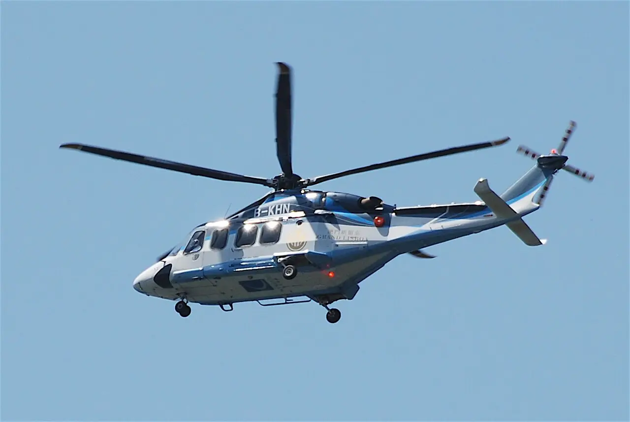 A helicopter flying over Hong Kong Island