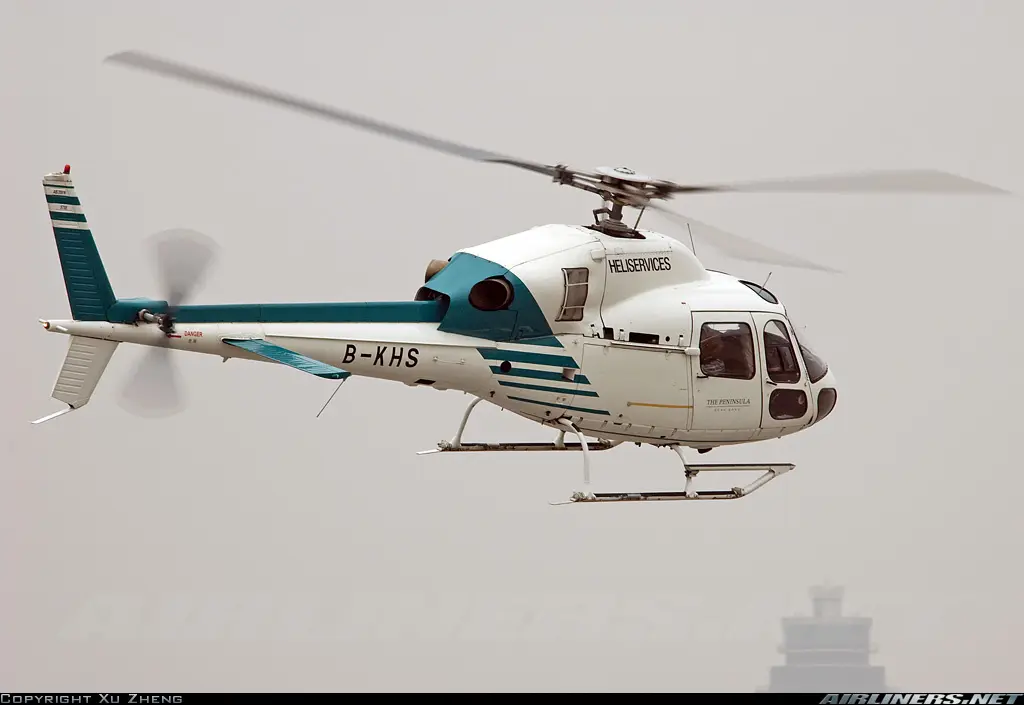 A Heliservices helicopter in flight