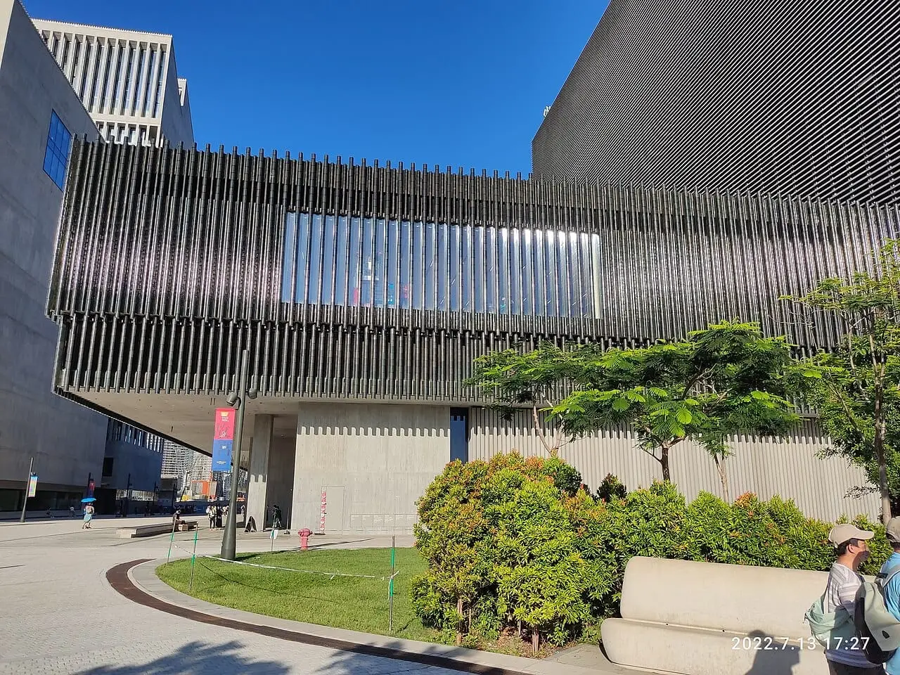 The M+ museum building and gardens in West Kowloon