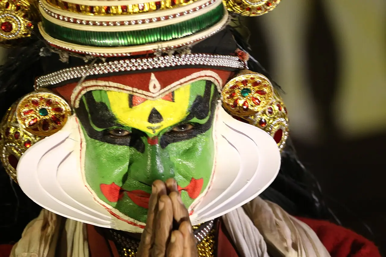 A Kathakali artist's painted green face