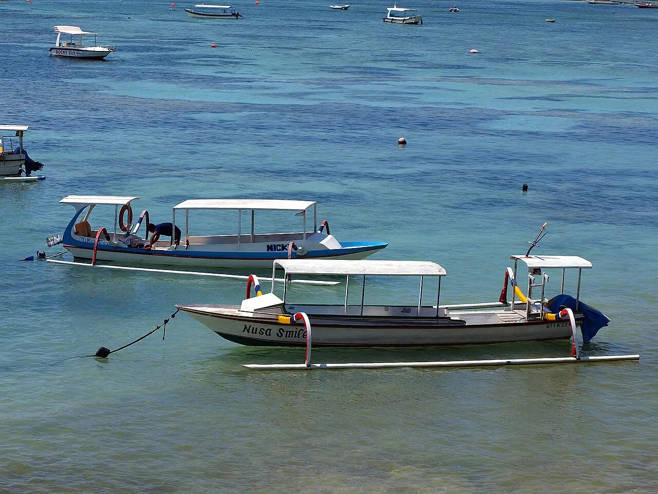 Traditional boats moored off Nusa Lembongan