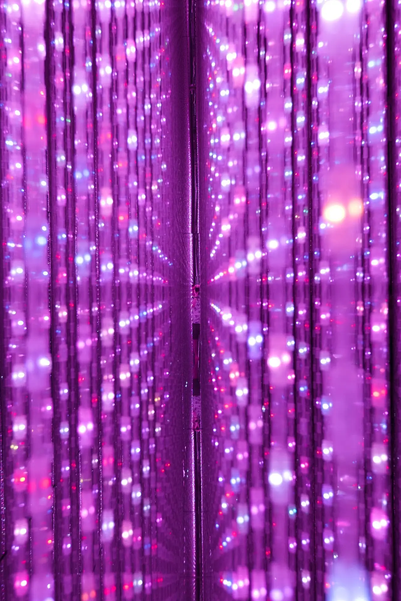 Pink lights in the Infinite Crystal Universe