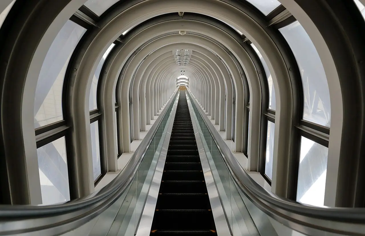 The glass-tube escalator up to the Floating Garden Observatory