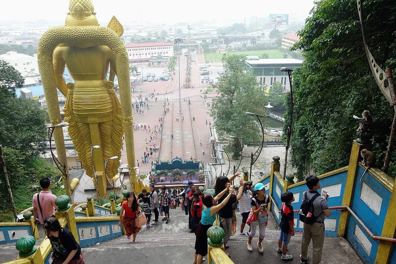 The golden Murugan statue and stairs at Batu Caves