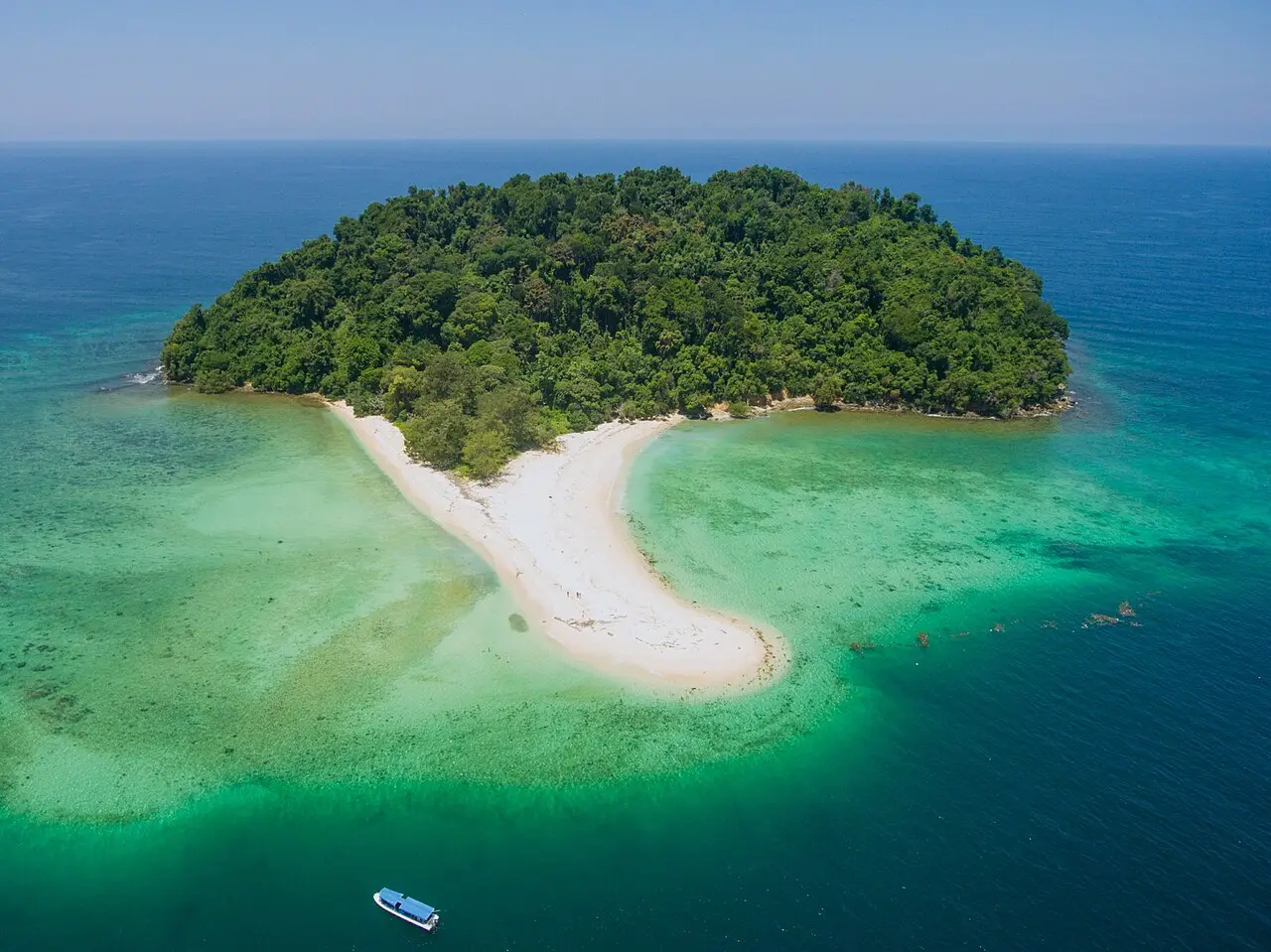 An island with a white sandbar in the Tunku Abdul Rahman Marine Park