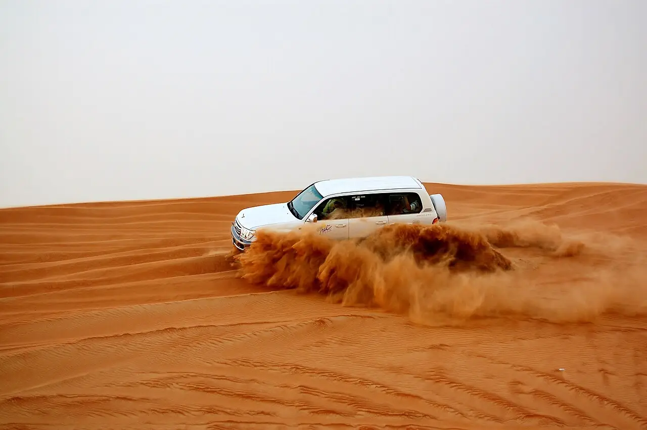 4x4s dune bashing over the red dunes