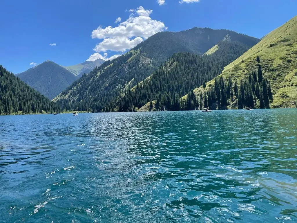 Kolsai Lake ringed by spruce forest