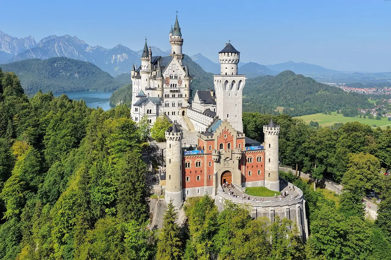Neuschwanstein Castle with the Alpsee behind