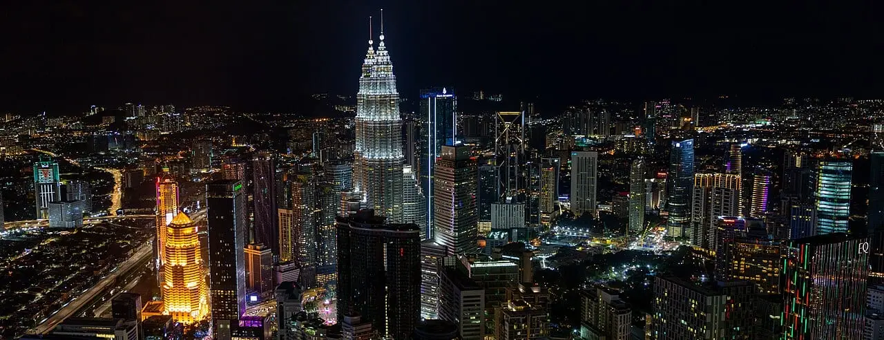 The Petronas Twin Towers at night, seen from KL Tower