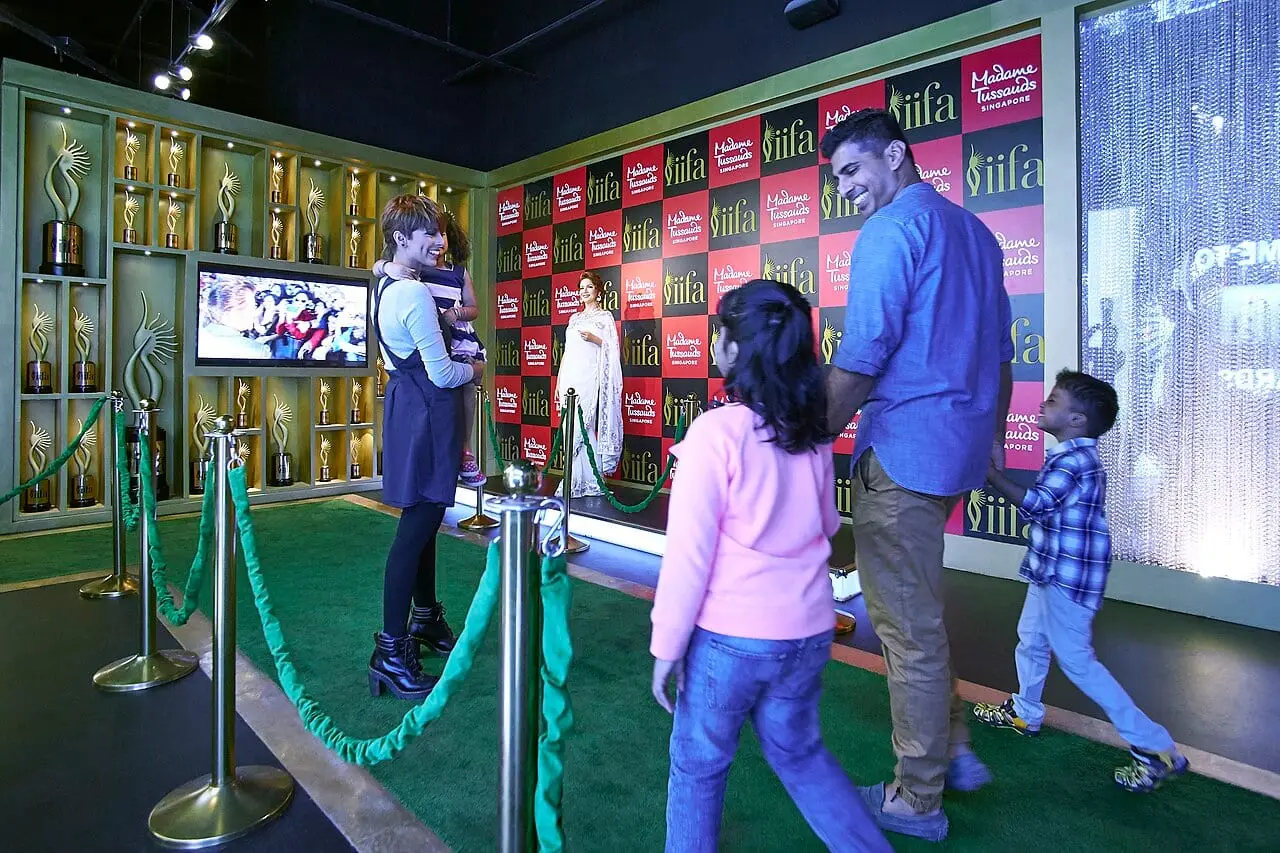 Visitors on the IIFA green carpet at Madame Tussauds Singapore