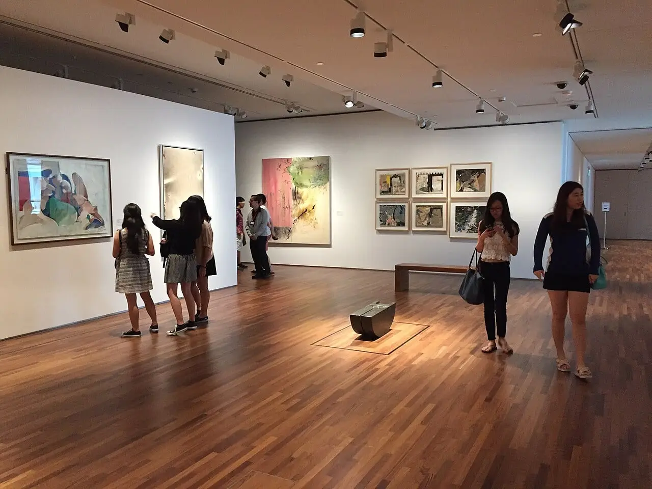 Visitors in a gallery of Singapore art