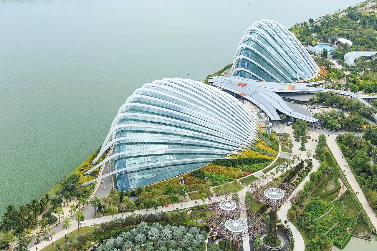 The two glass domes of Gardens by the Bay beside the water