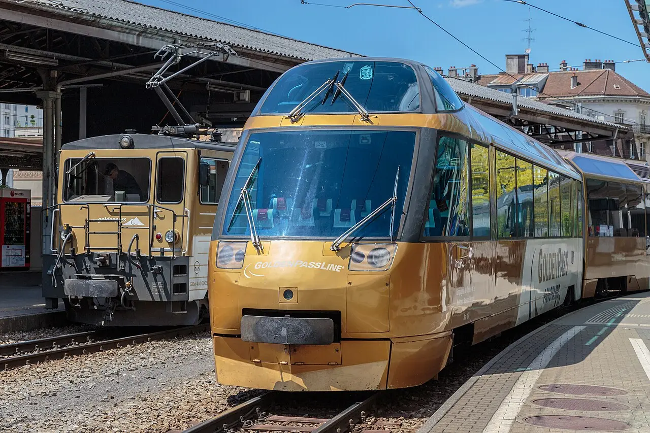 A golden GoldenPass panoramic train