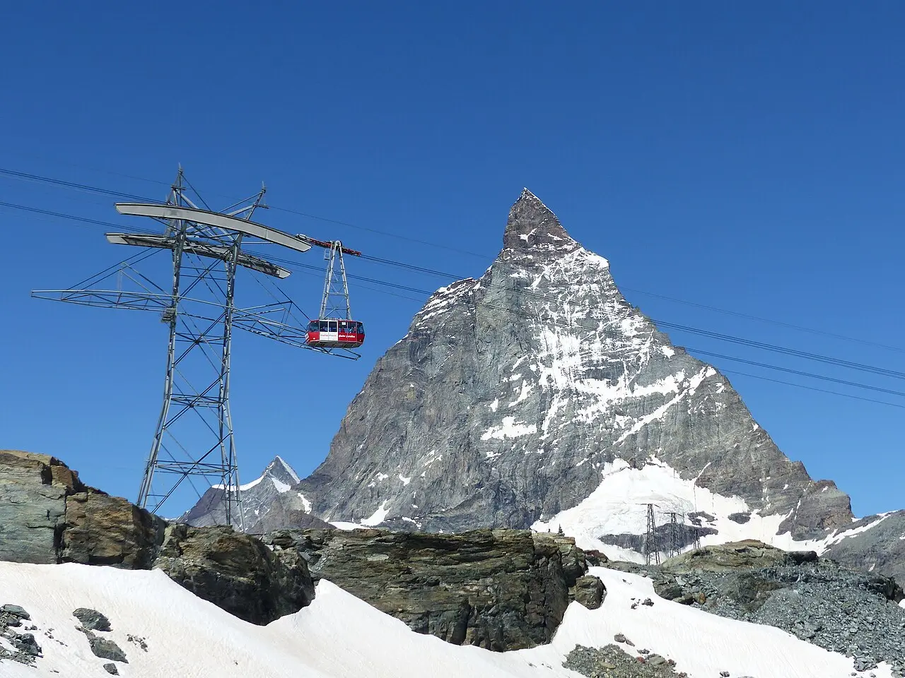 A cable car with the Matterhorn behind