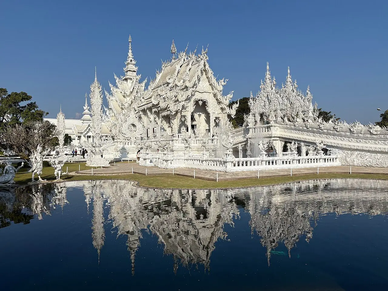 The White Temple, Wat Rong Khun, reflected in its pond