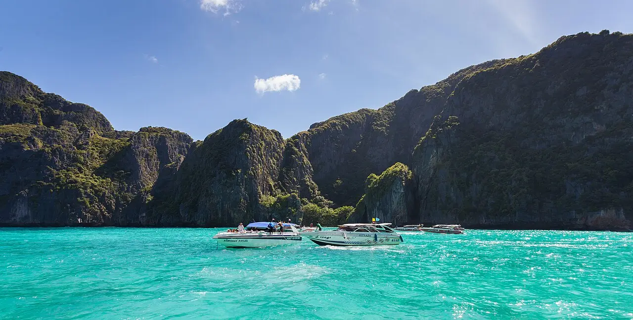 Clear shallow water and white sand at Maya Bay