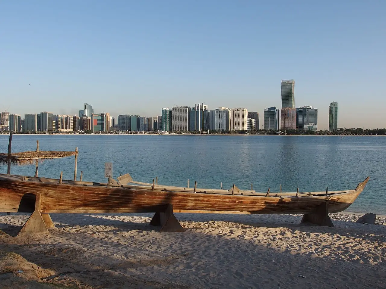 Traditional dhows in front of the Abu Dhabi skyline
