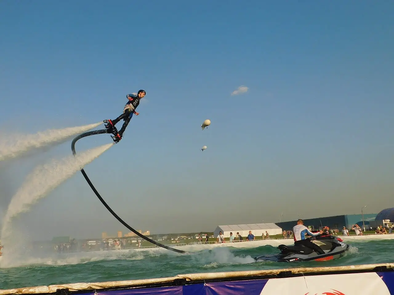 A flyboarder diving