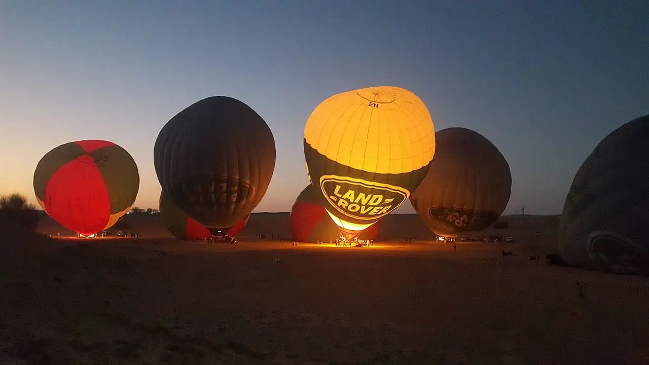 Balloons being inflated before dawn