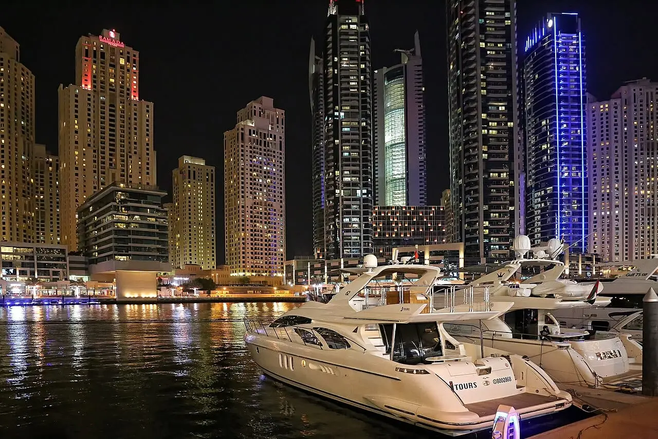 Yachts in Dubai Marina at night