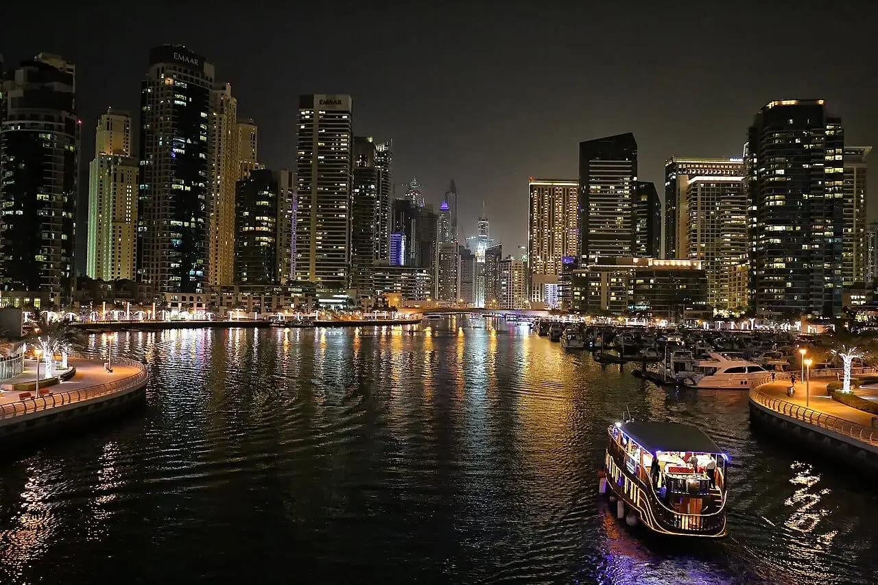 Cruise boats in Dubai Marina at night