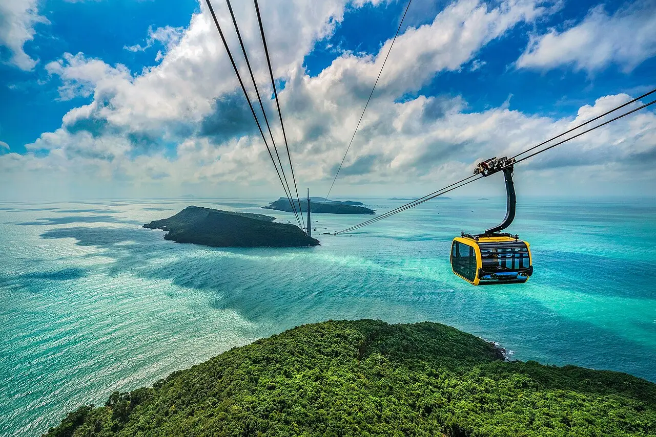 A Hon Thom cable car cabin over turquoise sea and islands