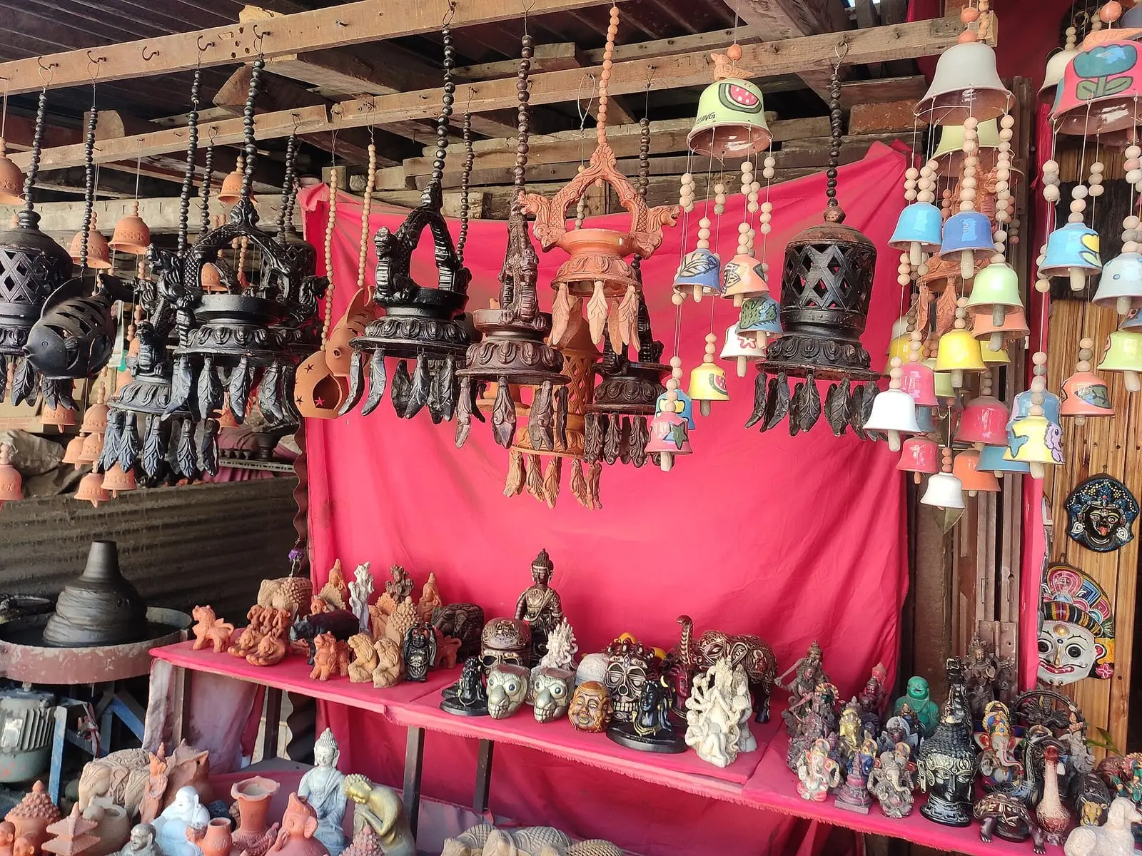 Handmade masks and crafts for sale near Bhaktapur's Pottery Square