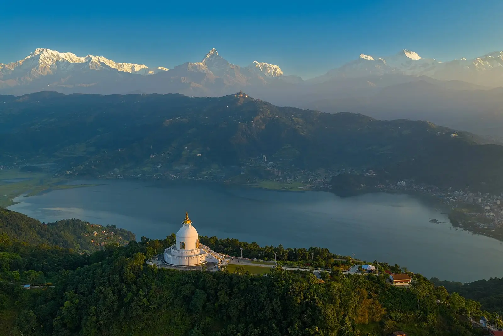 Sunrise over the World Peace Pagoda in Pokhara with the Annapurna range behind