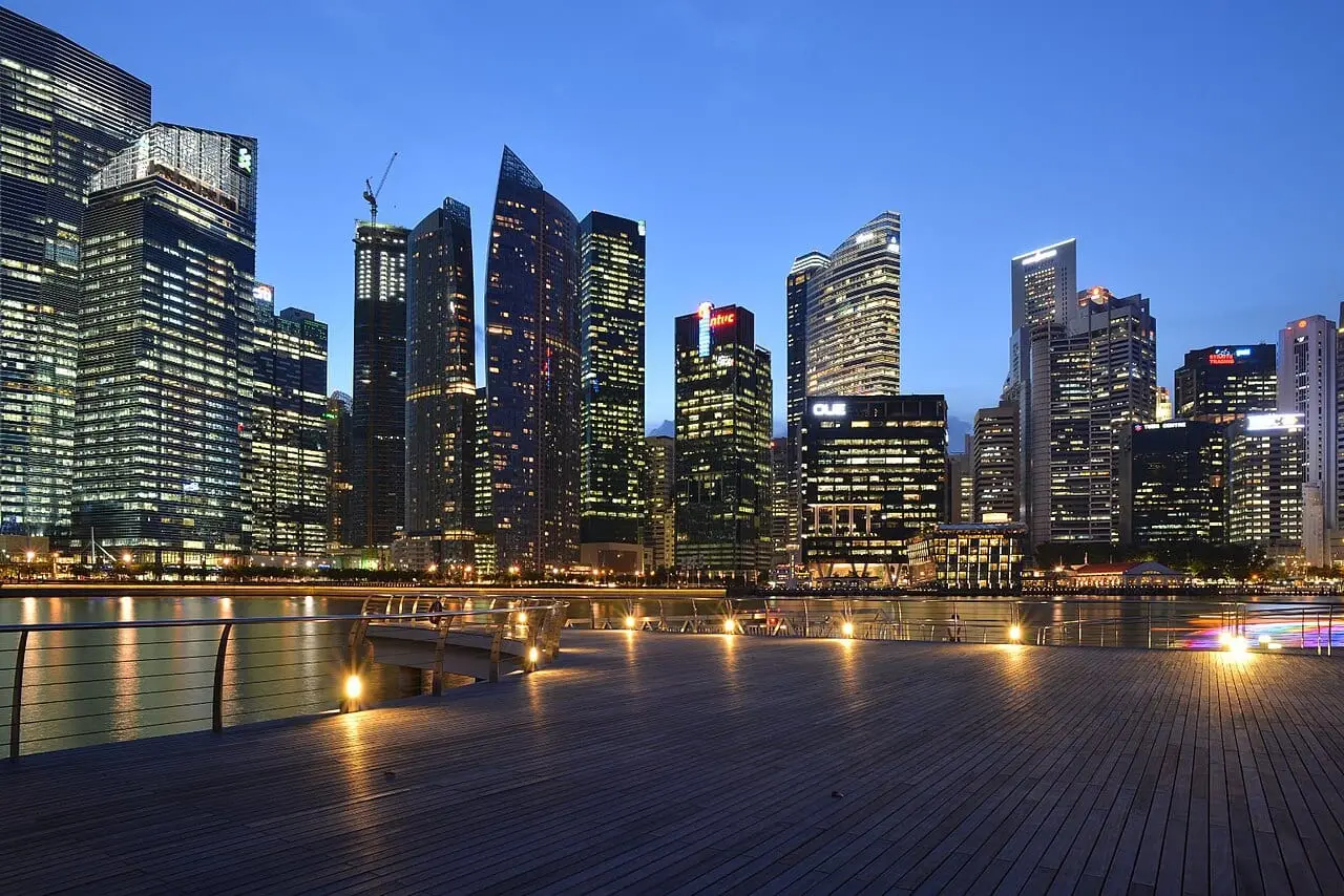 The Singapore skyline across Marina Bay at dusk
