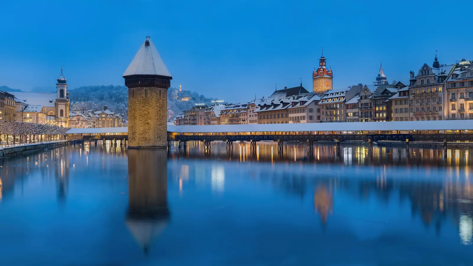 Lucerne's Chapel Bridge and water tower at blue hour