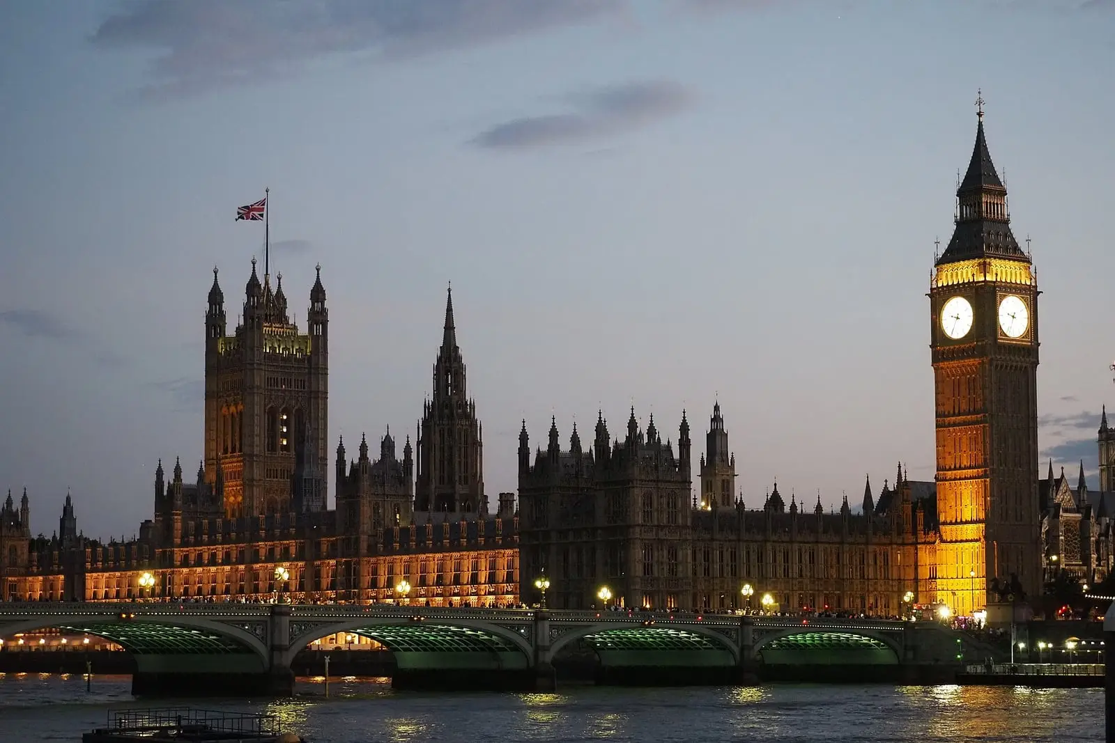 Big Ben and the Palace of Westminster lit up at blue hour
